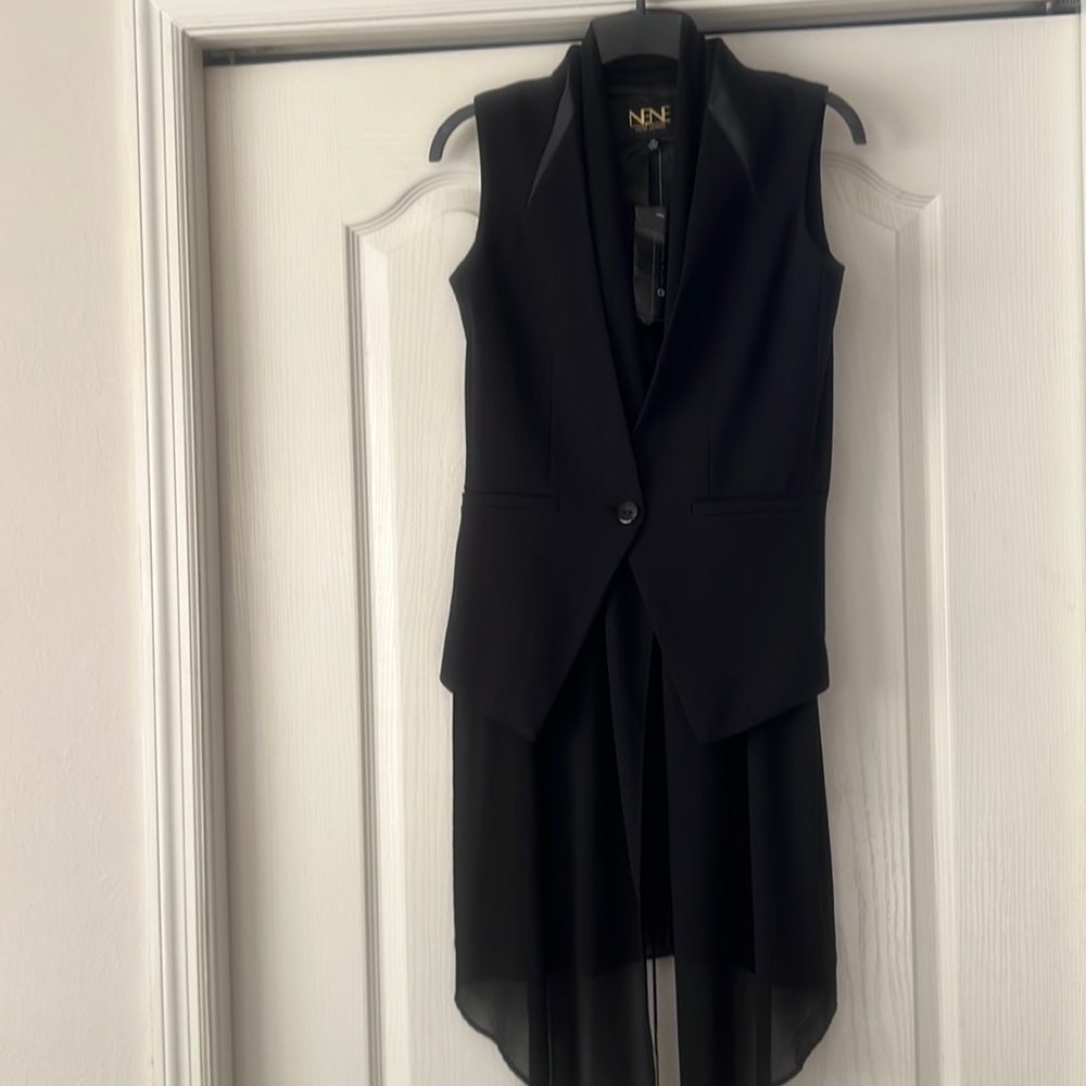 Fully lined formal Vest with added sheer fabric.